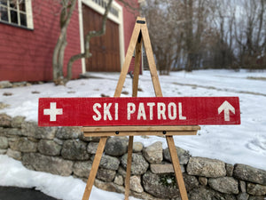 Large Ski Patrol Sign on Rustic Barnboard