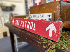 Large Ski Patrol Sign on Rustic Barnboard