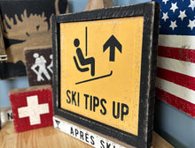 Load image into Gallery viewer, Ski Tips Up wood sign.  Yellow with black frame.